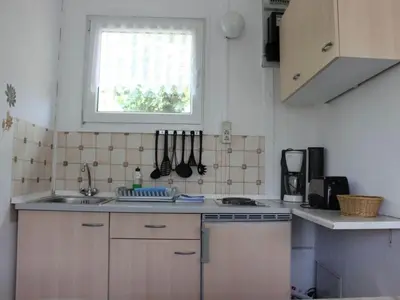 Küche/Küchenzeile in der Unterkunft Bungalow Oberspreewald 3