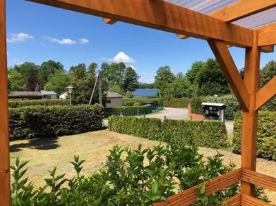 Ein Garten an der Unterkunft Bungalow Oberspreewald 5