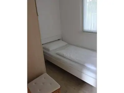 Ein Bett oder Betten in einem Zimmer der Unterkunft Bungalow Oberspreewald 5