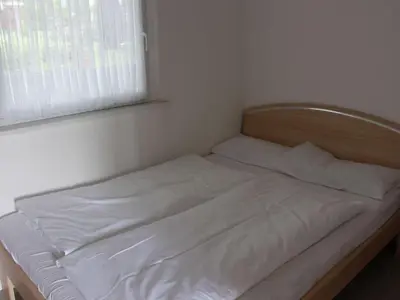 Ein Bett oder Betten in einem Zimmer der Unterkunft Bungalow Oberspreewald 5