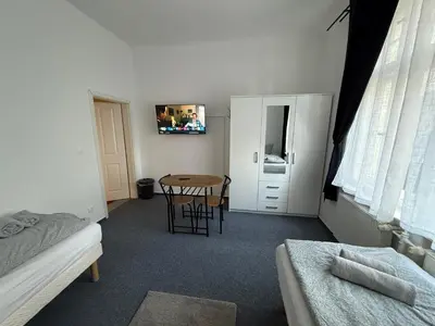Ein Bett oder Betten in einem Zimmer der Unterkunft POTSDAM HERITAGE APARTMENT