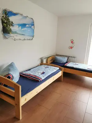 Ein Bett oder Betten in einem Zimmer der Unterkunft Moderne Unterkunft für Monteure nahe Berlin