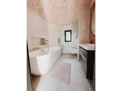 Ein Bett oder Betten in einem Zimmer der Unterkunft Super nice holiday home by the lake