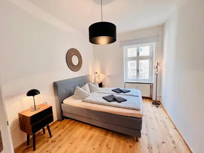 Ein Bett oder Betten in einem Zimmer der Unterkunft Central City Cosy Lux