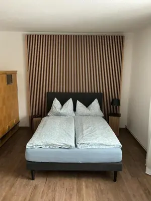 Ein Bett oder Betten in einem Zimmer der Unterkunft Ferienwohnung am Netzener See
