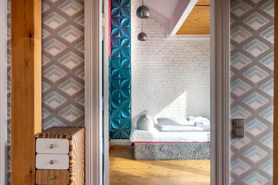 Ein Bett oder Betten in einem Zimmer der Unterkunft Top floor Penthouse with Garden