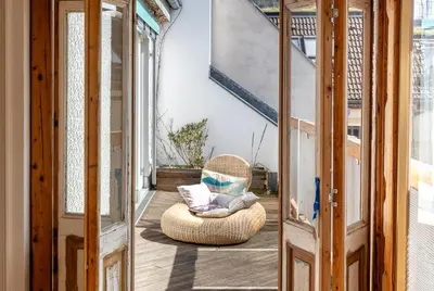 Ein Balkon oder eine Terrasse in der Unterkunft Top floor Penthouse with Garden