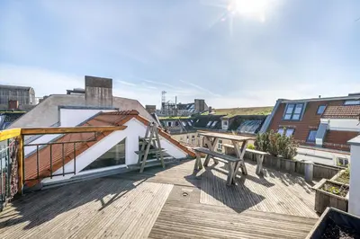 Ein Balkon oder eine Terrasse in der Unterkunft Top floor Penthouse with Garden