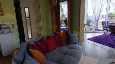 Ein Sitzbereich in der Unterkunft Ferienhaus Rose & Lavendel