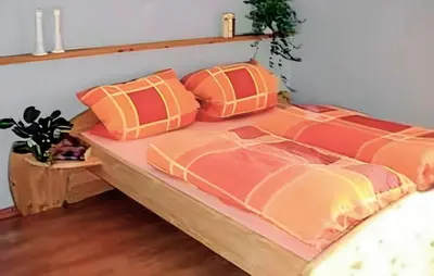 Ein Bett oder Betten in einem Zimmer der Unterkunft Wohnung Templin Ot Dargersdorf