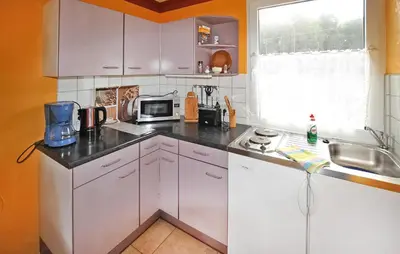 Küche/Küchenzeile in der Unterkunft Ferienhaus Rheinsberg