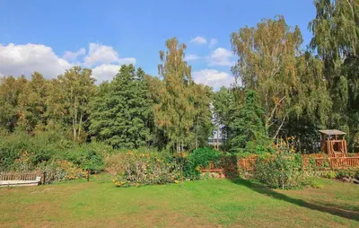 Ein Garten an der Unterkunft Ferienhaus Rheinsberg
