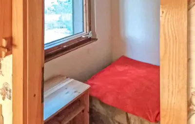 Ein Bett oder Betten in einem Zimmer der Unterkunft Ferienhaus Märkische Heide