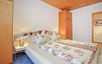 Ein Bett oder Betten in einem Zimmer der Unterkunft Ferienwohnung Milmersdorf