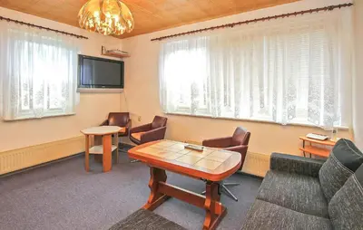 Ein Sitzbereich in der Unterkunft Ferienwohnung Milmersdorf