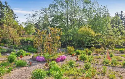 Ein Garten an der Unterkunft Ferienhaus Rheinsberg