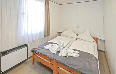 Ein Bett oder Betten in einem Zimmer der Unterkunft Fh Brombeere