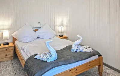 Ein Bett oder Betten in einem Zimmer der Unterkunft Fh Maisgelb
