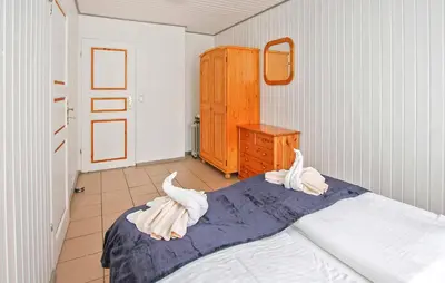 Ein Bett oder Betten in einem Zimmer der Unterkunft Fh Orange