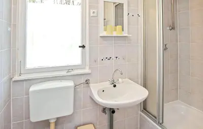 Ein Badezimmer in der Unterkunft Fh Rot