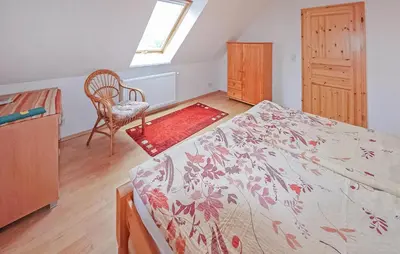 Ein Bett oder Betten in einem Zimmer der Unterkunft Ferienhaus Röddelin