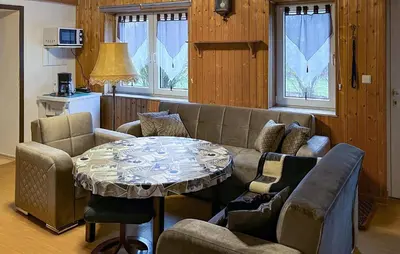 Ein Sitzbereich in der Unterkunft Ferienwohnung Lychen