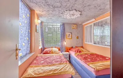 Ein Bett oder Betten in einem Zimmer der Unterkunft Ferienhaus Fürstenberghavel