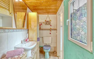 Ein Badezimmer in der Unterkunft Ferienhaus Fürstenberghavel
