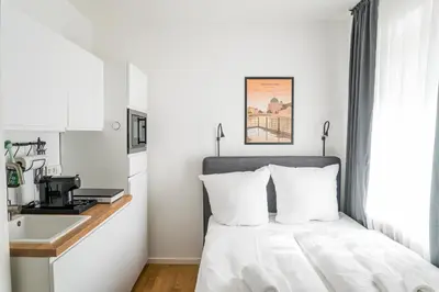 Ein Bett oder Betten in einem Zimmer der Unterkunft Homaris Apartments Schlüterstraße