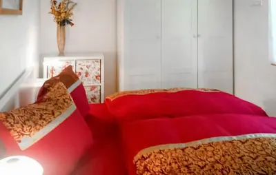 Ein Bett oder Betten in einem Zimmer der Unterkunft Ferienhaus Mahlow