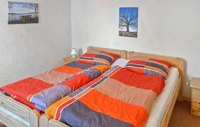 Ein Bett oder Betten in einem Zimmer der Unterkunft Ferienhaus Schorfheide
