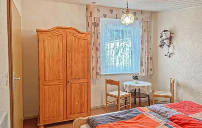 Ein Bett oder Betten in einem Zimmer der Unterkunft Ferienhaus Schorfheide