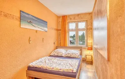 Ein Bett oder Betten in einem Zimmer der Unterkunft Ferienwohnung Fürstenberg