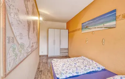 Ein Bett oder Betten in einem Zimmer der Unterkunft Ferienwohnung Fürstenberg