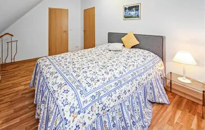 Ein Bett oder Betten in einem Zimmer der Unterkunft Ferienhaus Lychen