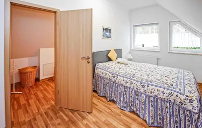 Ein Bett oder Betten in einem Zimmer der Unterkunft Ferienhaus Lychen