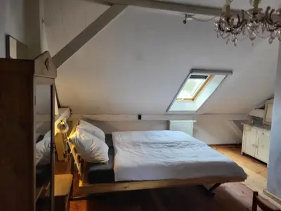 Ein Bett oder Betten in einem Zimmer der Unterkunft Alte Schule Brodowin