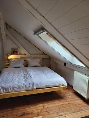 Ein Bett oder Betten in einem Zimmer der Unterkunft Alte Schule Brodowin