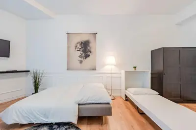 Ein Bett oder Betten in einem Zimmer der Unterkunft The Luxe Loft Berlin