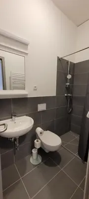Ein Badezimmer in der Unterkunft Queens Residenz