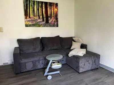 Ein Sitzbereich in der Unterkunft Cottage mit Garten