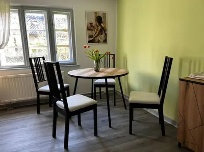 Ein Sitzbereich in der Unterkunft Cottage mit Garten