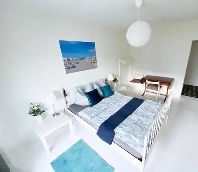 Ein Bett oder Betten in einem Zimmer der Unterkunft Amazing apartment in the heart of Berlin next to Check Point Charlie, 1 to 4 Guests