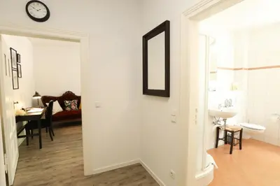 Ein Bett oder Betten in einem Zimmer der Unterkunft Kl. Fontane Ferienwohnung Bad Freienwalde direkt am Markt