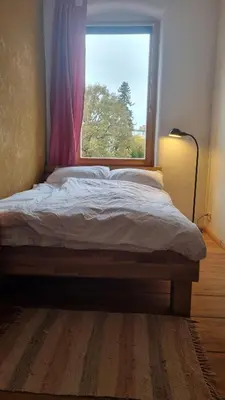 Ein Bett oder Betten in einem Zimmer der Unterkunft Wohnung in der Waldstadt