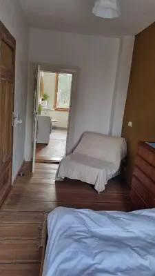 Ein Bett oder Betten in einem Zimmer der Unterkunft Wohnung in der Waldstadt
