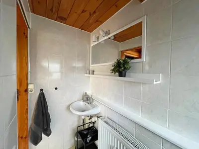 Ein Badezimmer in der Unterkunft Tiny House mit Garten in See-Nähe