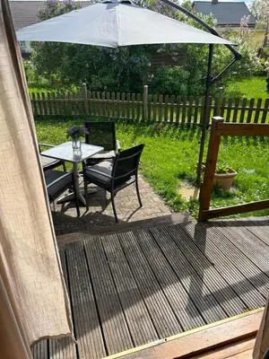 Ein Garten an der Unterkunft Tiny House mit Garten in See-Nähe