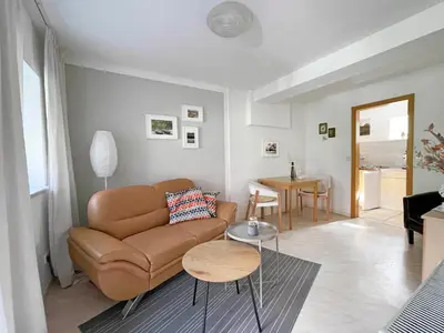 Ein Sitzbereich in der Unterkunft Gemütliche Wohnung Landlust in See-Nähe