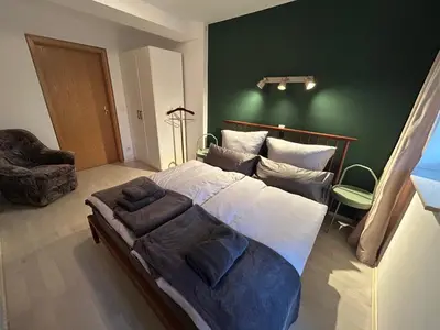 Ein Bett oder Betten in einem Zimmer der Unterkunft Gemütliche Wohnung Landlust in See-Nähe